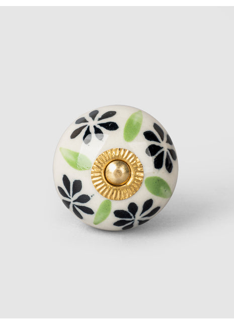Black Flower and Green Leaf on White Ceramic Knob