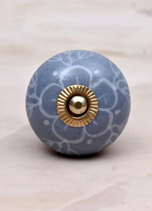 White Floral Pattern on Powder Blue Ceramic Door Knob