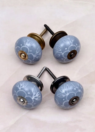 White Floral Pattern on Powder Blue Ceramic Door Knob