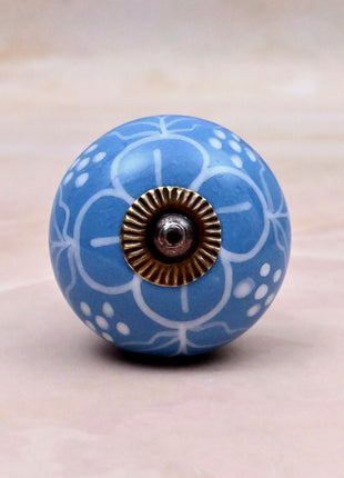 White Design on Turquoise Base Ceramic Door Knob