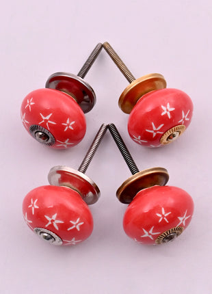 White Starburst on Red Ceramic Door Knob