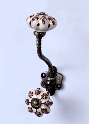 Brown Flower design On White Base Ceramic Knob With Metal Wall Hanger