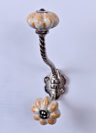 Yellow Flower design On White Base Ceramic Knob With Metal Wall Hanger