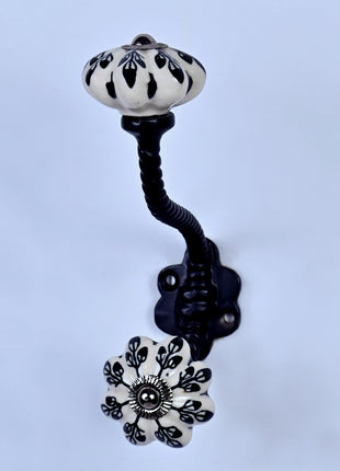 Black Flower Design Off White Base Ceramic Knob With Metal Wall Hanger