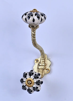 Black Flower Design Off White Base Ceramic Knob With Metal Wall Hanger