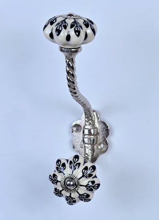 Black Flower Design Off White Base Ceramic Knob With Metal Wall Hanger