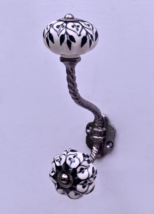 Black Design on White Ceramic Knob With Metal Wall Hanger