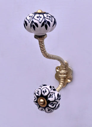 Black Design on White Ceramic Knob With Metal Wall Hanger