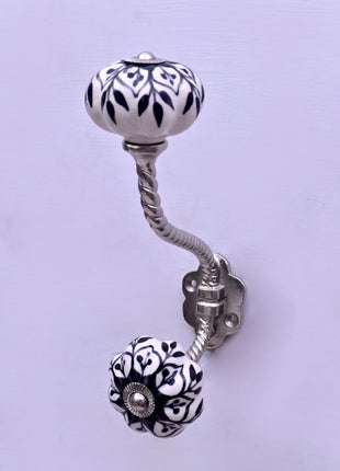 Black Design on White Ceramic Knob With Metal Wall Hanger