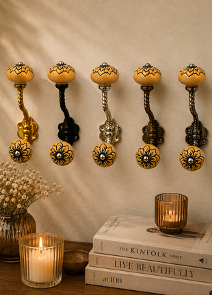Black Design on Yellow Ceramic Knob With Metal Wall Hanger