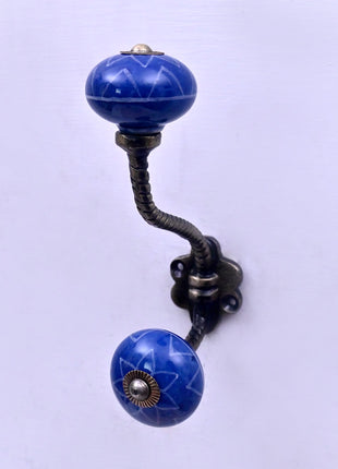 White Design on Blue Ceramic Knob With Metal Wall Hanger