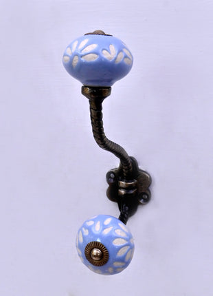 White Design on Soft Powder Blue Ceramic Knob With Metal Wall Hanger
