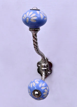 White Design on Soft Powder Blue Ceramic Knob With Metal Wall Hanger