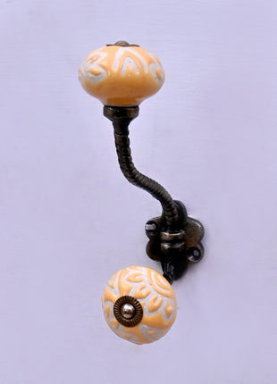 Yellow Embossed Ceramic Knob With Metal Wall Hanger