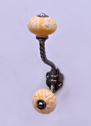 Yellow Embossed Ceramic Knob With Metal Wall Hanger
