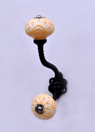 Yellow Embossed Ceramic Knob With Metal Wall Hanger