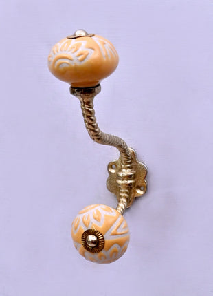 Yellow Embossed Ceramic Knob With Metal Wall Hanger