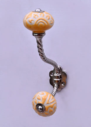 Yellow Embossed Ceramic Knob With Metal Wall Hanger