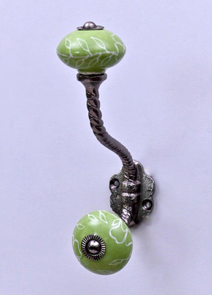White Outline on Green Base Ceramic Knob With Metal Wall Hanger