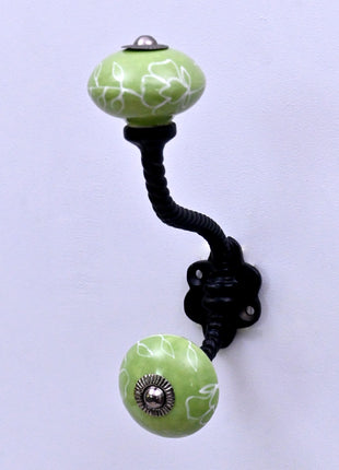 White Outline on Green Base Ceramic Knob With Metal Wall Hanger
