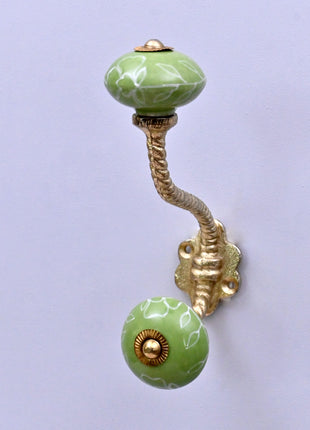 White Outline on Green Base Ceramic Knob With Metal Wall Hanger