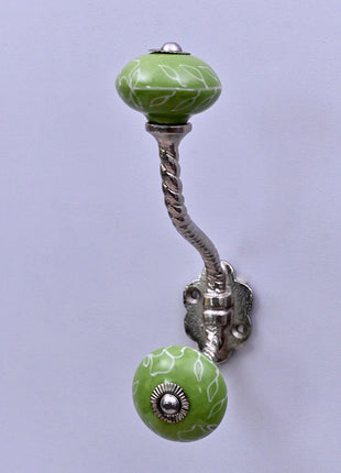 White Outline on Green Base Ceramic Knob With Metal Wall Hanger