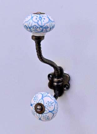 Blue Floral Pattern on White Ceramic Knob With Metal Wall Hanger