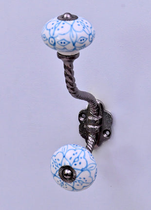 Blue Floral Pattern on White Ceramic Knob With Metal Wall Hanger