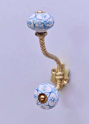 Blue Floral Pattern on White Ceramic Knob With Metal Wall Hanger