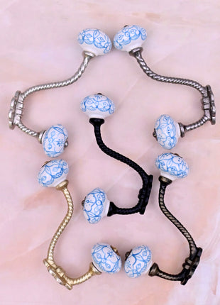 Blue Floral Pattern on White Ceramic Knob With Metal Wall Hanger