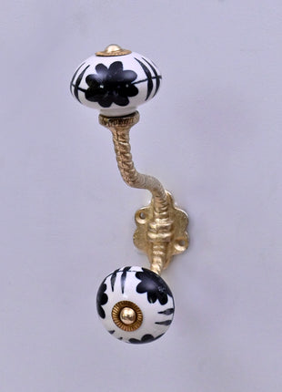 Black Design On White Ceramic Knob With Metal Wall Hanger