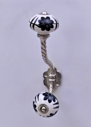Black Design On White Ceramic Knob With Metal Wall Hanger