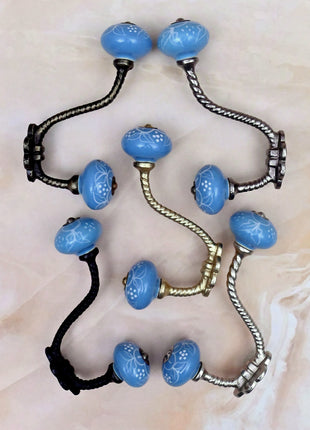 White Design on Turquoise Base Ceramic Knob With Metal Wall Hanger