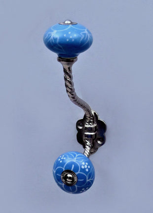 White Design on Turquoise Base Ceramic Knob With Metal Wall Hanger