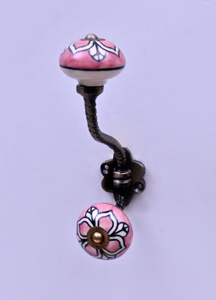 White Design on Pink Ceramic Knob With Metal Wall Hanger