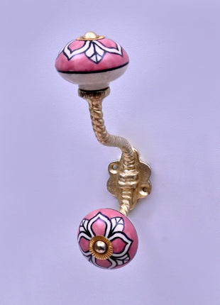 White Design on Pink Ceramic Knob With Metal Wall Hanger