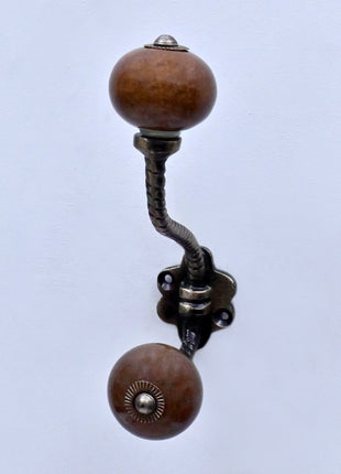 Brown Ceramic Knob With Metal Wall Hanger