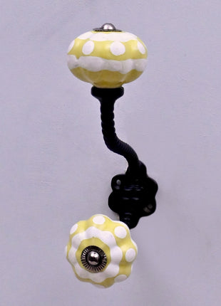 Yellow and White Ceramic Knob With Metal Wall Hanger