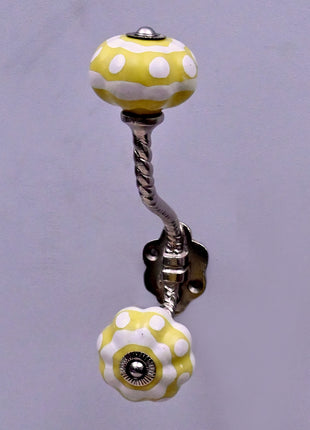 Yellow and White Ceramic Knob With Metal Wall Hanger