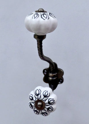 Black Design on White Ceramic Knob With Metal Wall Hanger