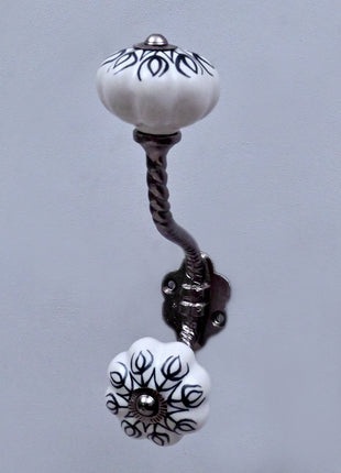 Black Design on White Ceramic Knob With Metal Wall Hanger
