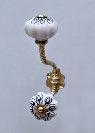 Black Design on White Ceramic Knob With Metal Wall Hanger