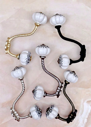 Black Design on White Ceramic Knob With Metal Wall Hanger