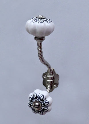 Black Design on White Ceramic Knob With Metal Wall Hanger