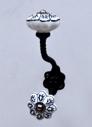 Black Design on White Ceramic Knob With Metal Wall Hanger