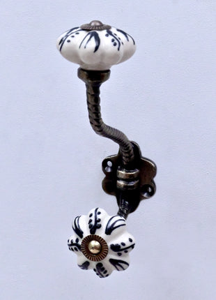 Black Design on Off White Ceramic Knob With Metal Wall Hanger