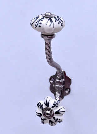 Black Design on Off White Ceramic Knob With Metal Wall Hanger