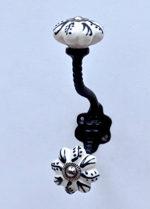 Black Design on Off White Ceramic Knob With Metal Wall Hanger