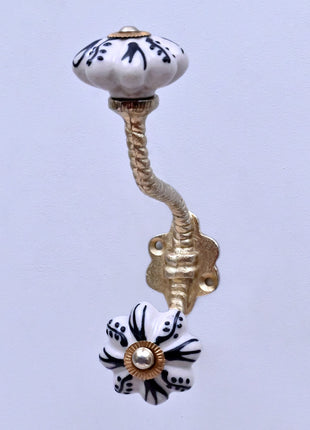 Black Design on Off White Ceramic Knob With Metal Wall Hanger