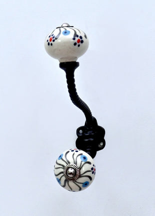 Black Swirl Pattern Ceramic Knob With Metal Wall Hanger